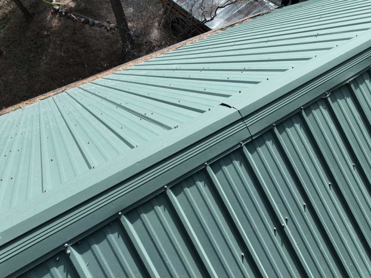 Metal roof showing hail damage in Colorado